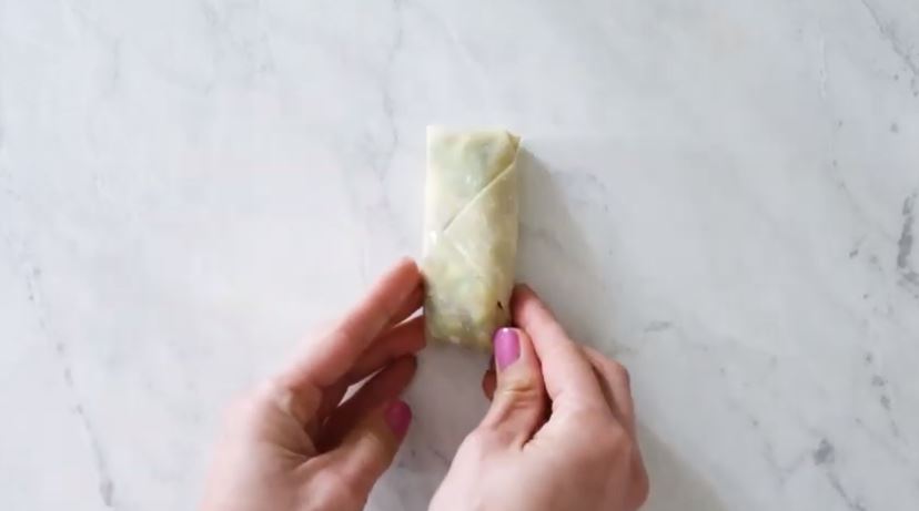 Looking for the perfect healthy appetizer? Picture avocado egg rolls served with a delicious sweet chili sauce, that makes one heck of a tasty bite.